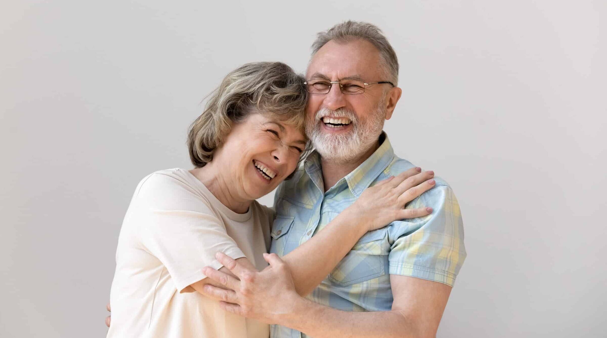 Sincere,Laughing,Bonding,Happy,Middle,Aged,Senior,Married,Couple,Cuddling,