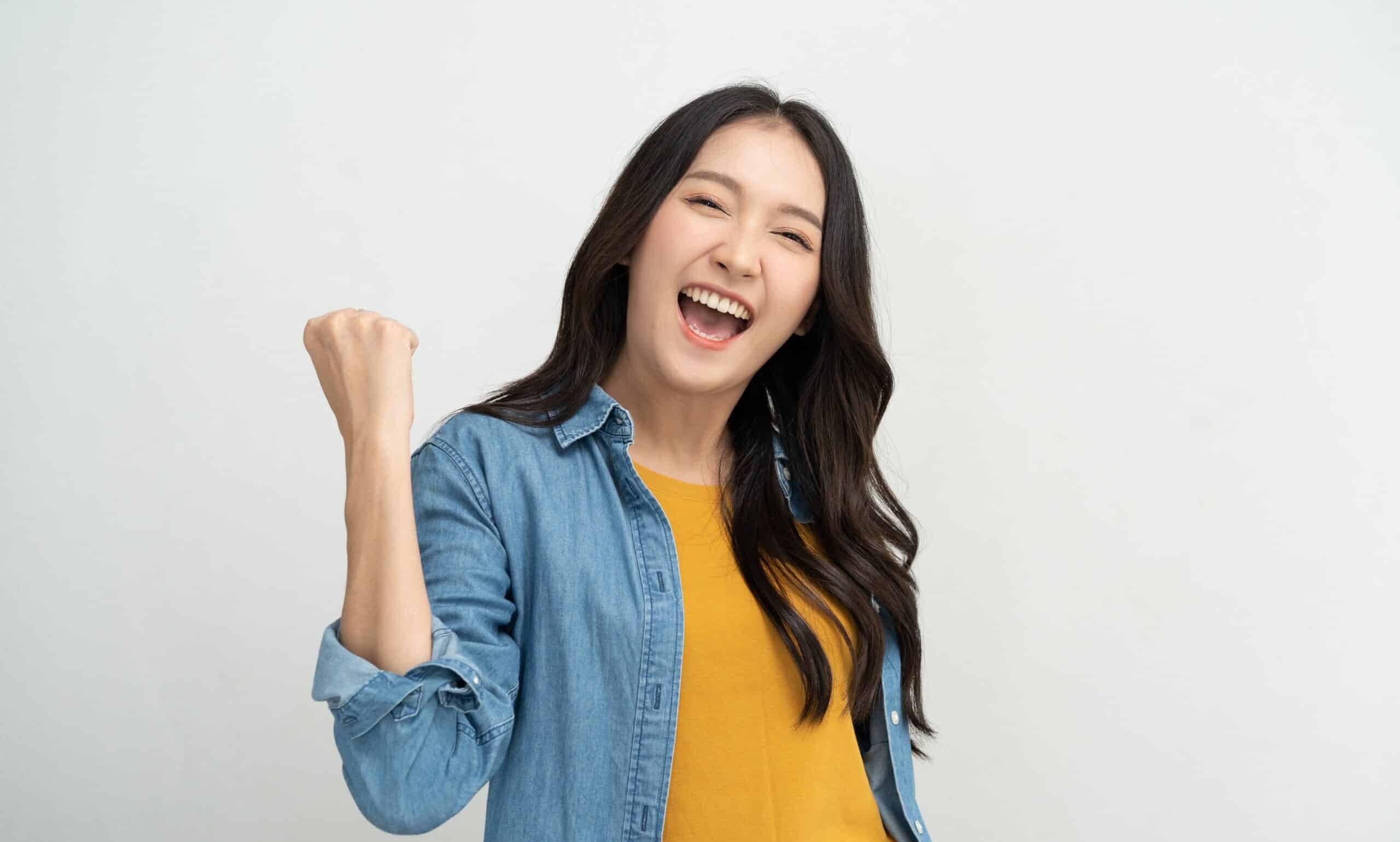 Happy,Asian,Woman,Winner,Joying,Winning,The,Prize.